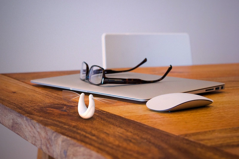 A 3D rendering of a Flyht lamp on a table.